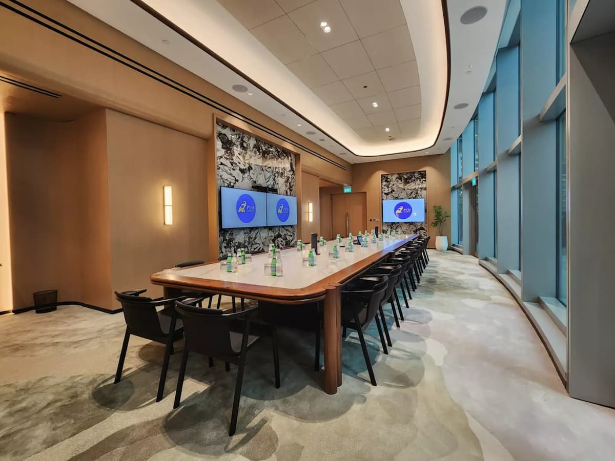 Elegant boardroom with long wooden table