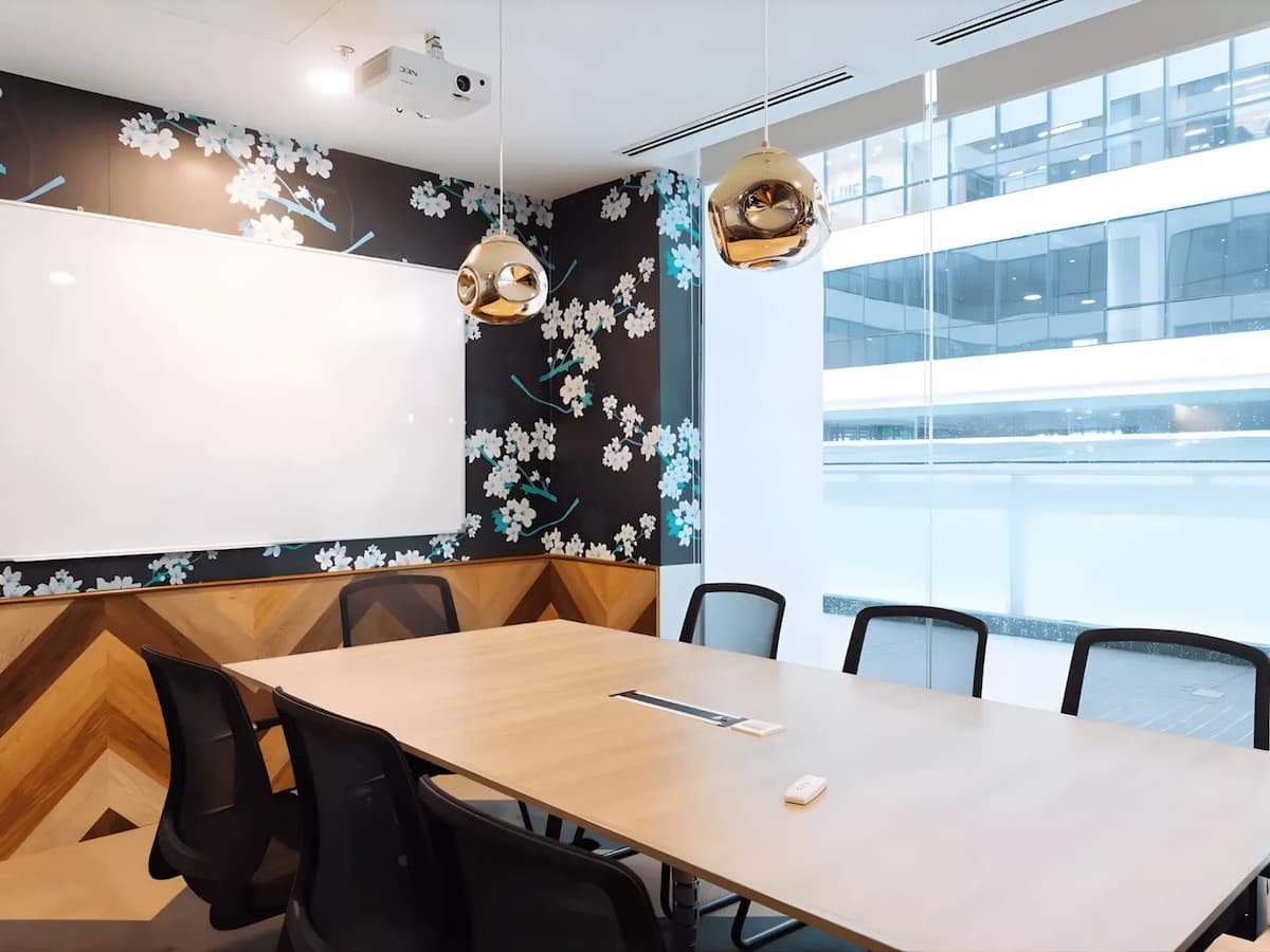 bright training room with whiteboard ceiling projector and floor to ceiling window at corporate event space in subang