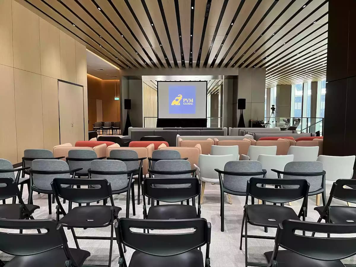 rows of chairs facing screen
