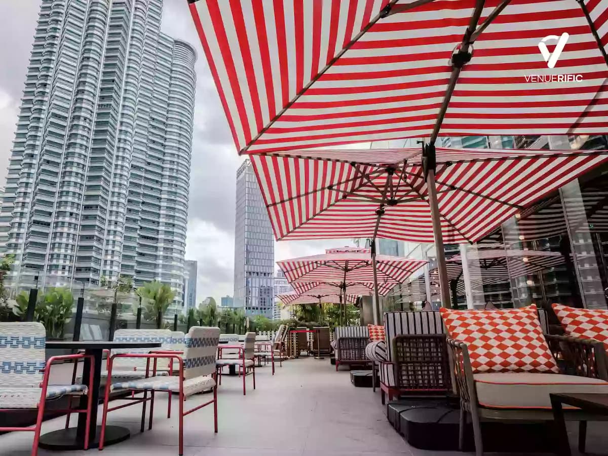 a rooftop terrace with PETRONAS twin tower view