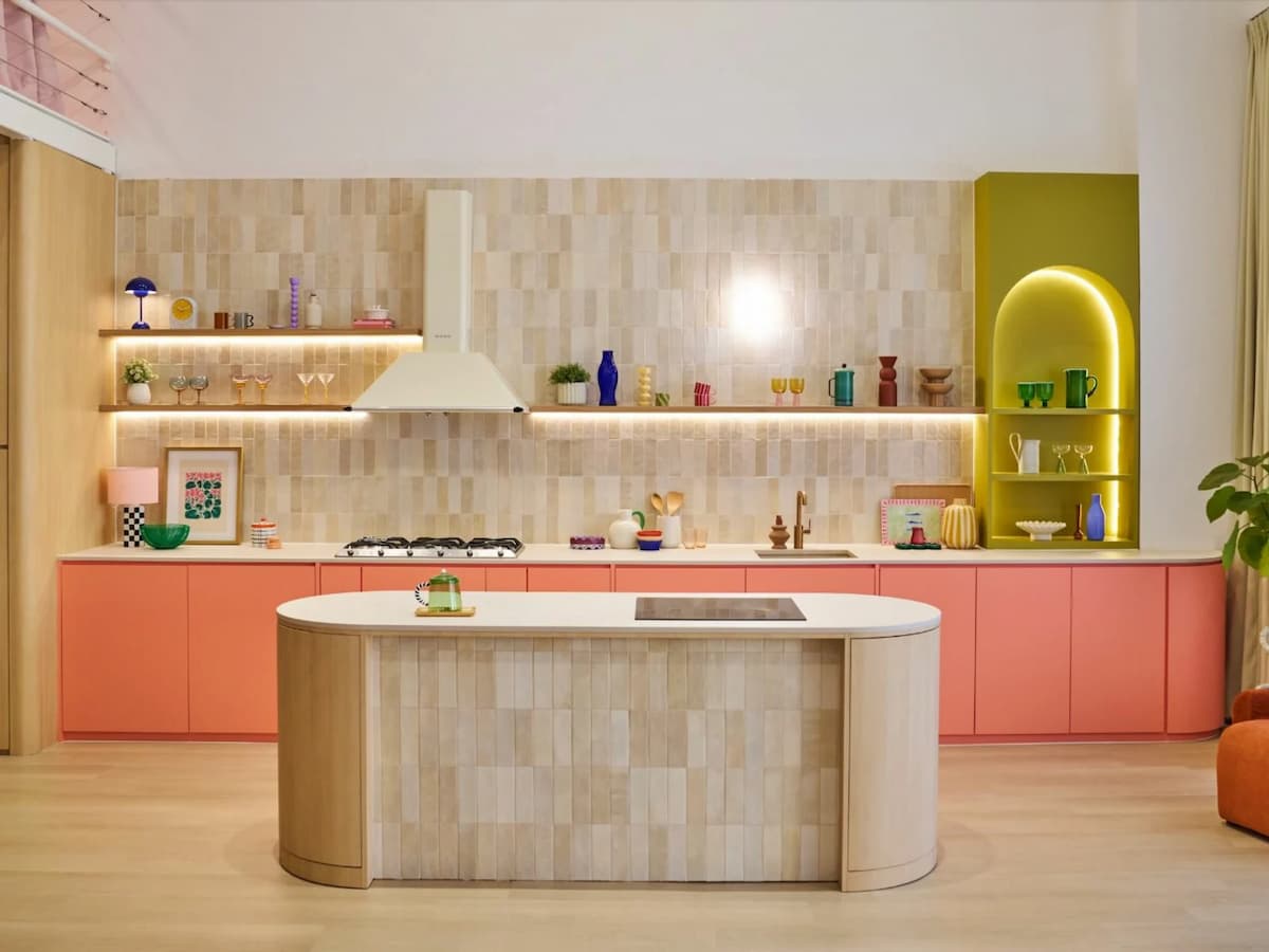 colourful designer kitchen with island counter and coral cabinets at studio colour event space singapore