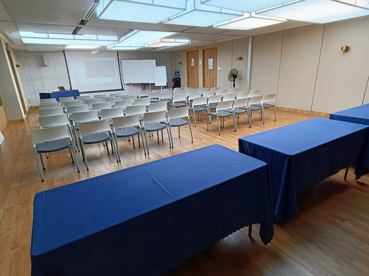 conference seating with blue registration tables set up for corporate event at north bridge road singapore