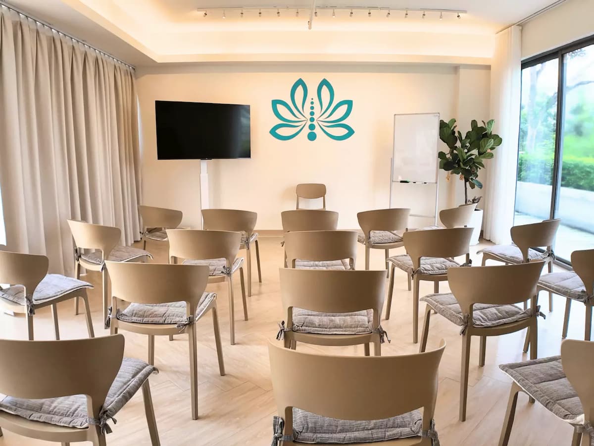 theatre style chair seating facing a tv screen at wellness workshop event space in bangsar south