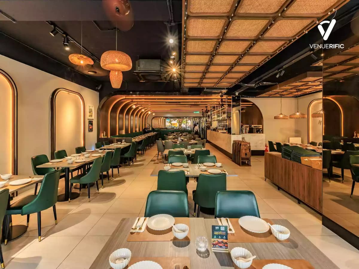 Spacious modern Thai restaurant with contemporary interiors, warm ambient lighting, and flexible dining layouts, ideal for corporate dinners, birthday celebrations, private events, and social gatherings.