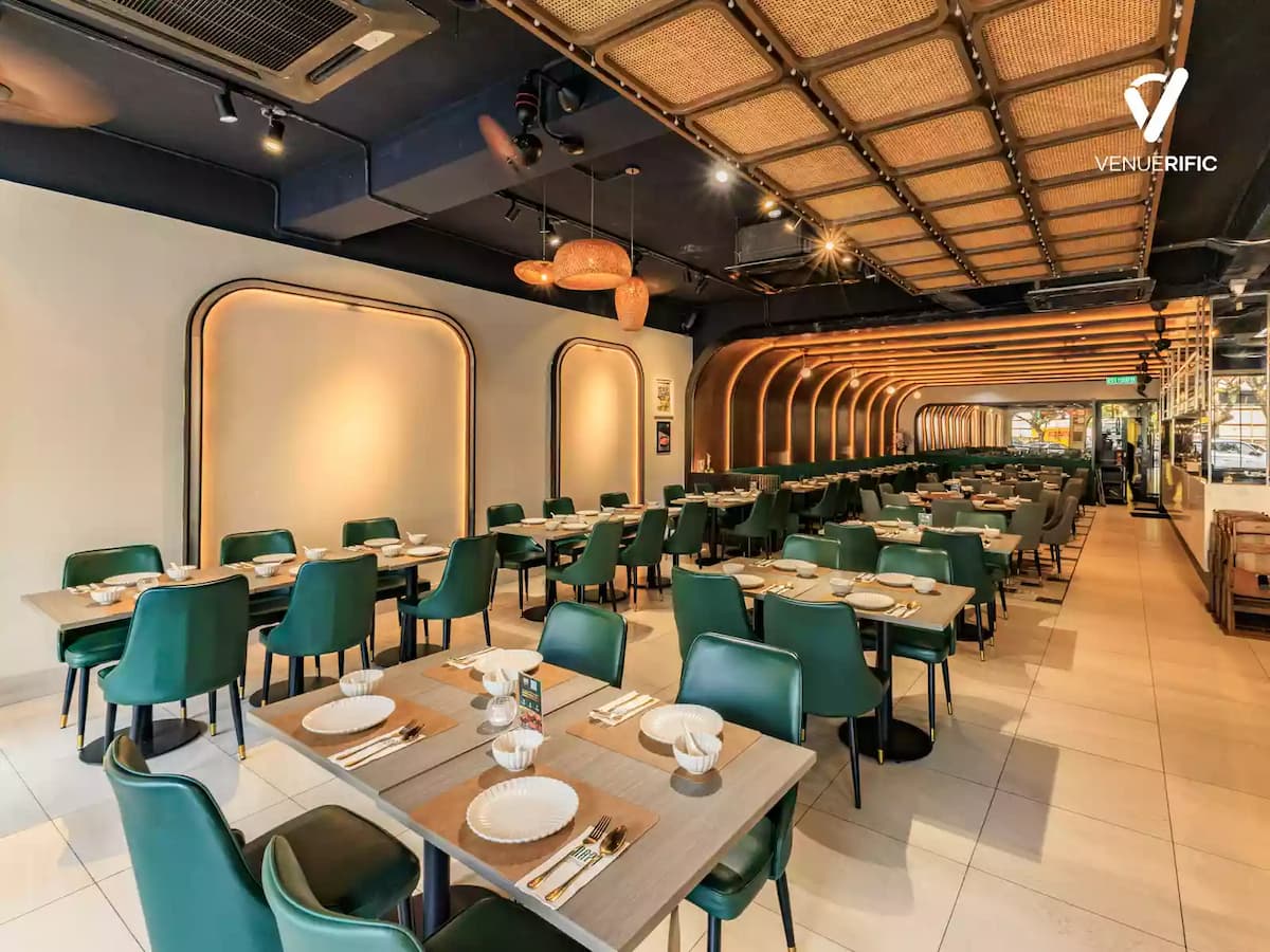 Contemporary Thai restaurant with spacious dining areas, stylish interiors, and warm ambient lighting, ideal for corporate gatherings, private dinners, birthday celebrations, and group dining experiences.