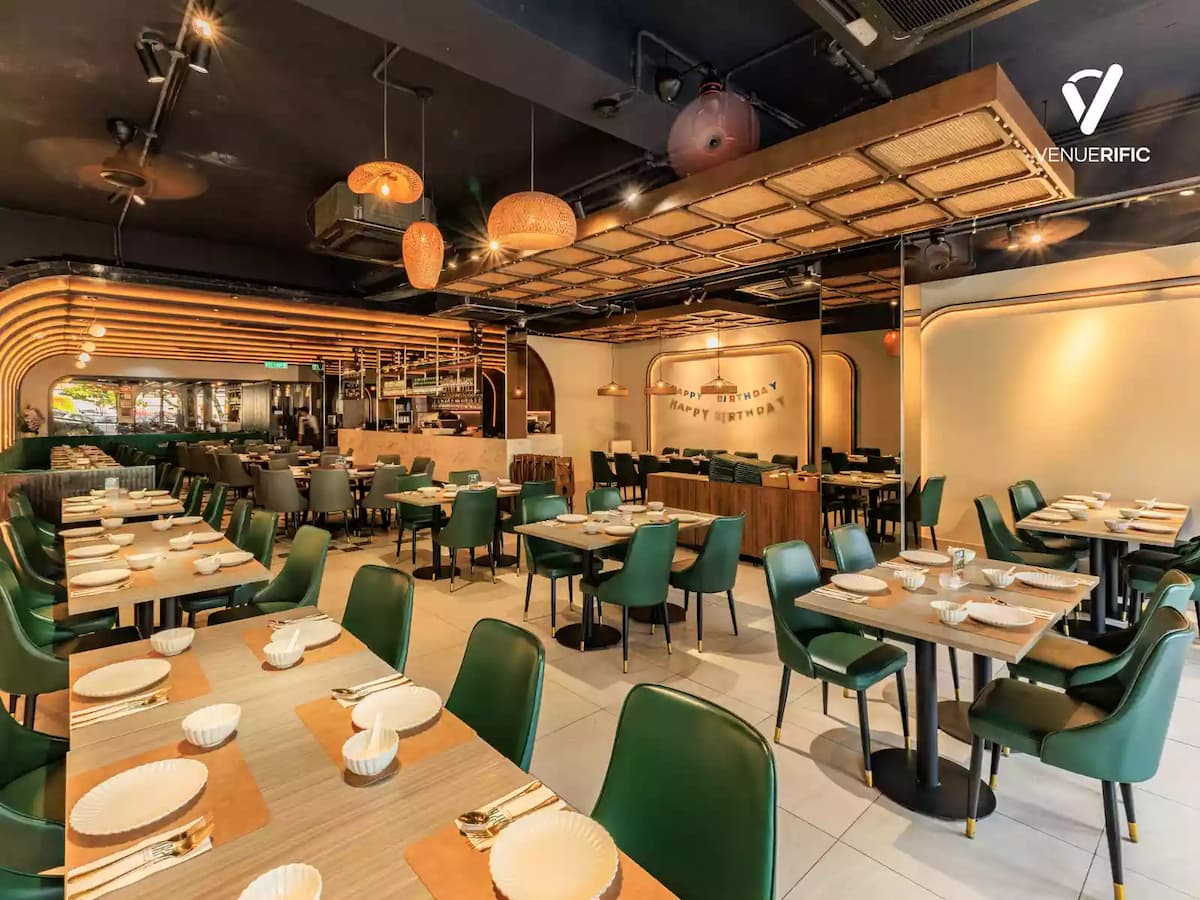 Modern Thai restaurant with stylish interiors, spacious dining areas, and warm ambient lighting, ideal for corporate events, private dining, birthday celebrations, networking sessions, and social gatherings.