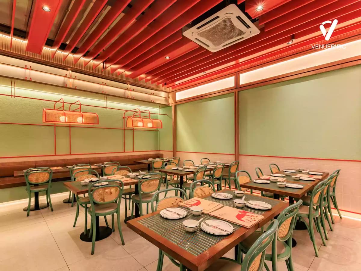 Contemporary Thai restaurant dining room with stylish interiors, flexible table arrangements, and vibrant oriental-inspired décor, ideal for corporate lunches, family gatherings, birthday celebrations, and private dining events.