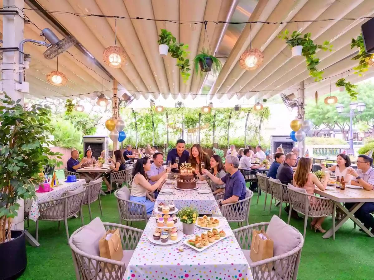 people are celebrating a vibrant birthday party