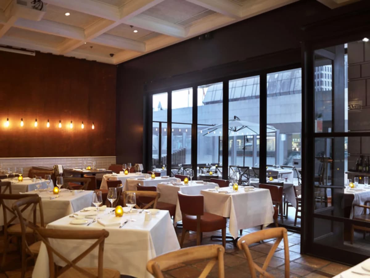 indoor italian restaurant with floor to ceiling window