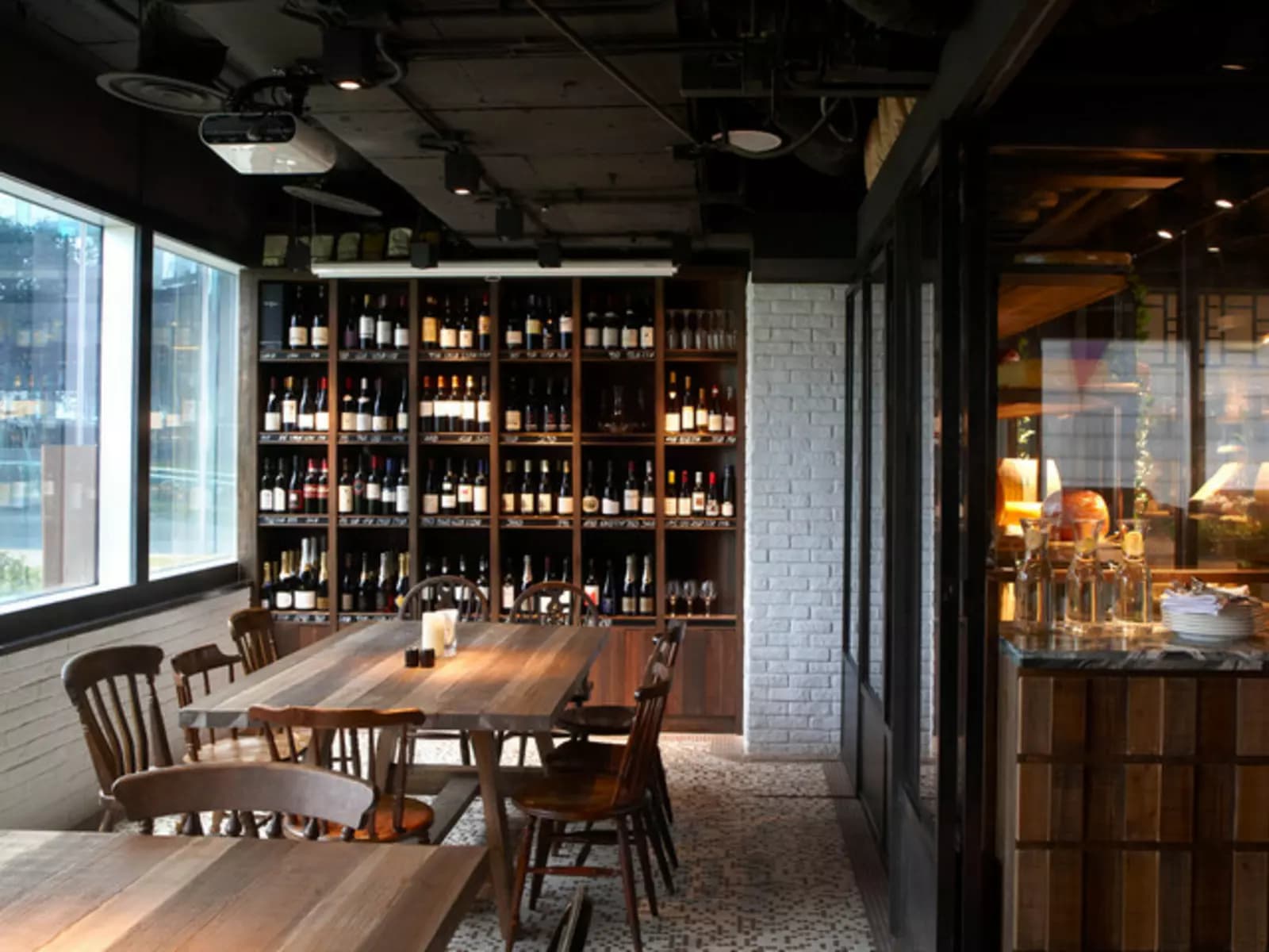 one of the dining spot near the wine shelf