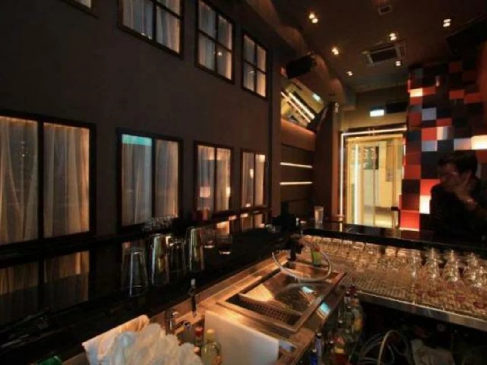 bar area with beer tab and glasses