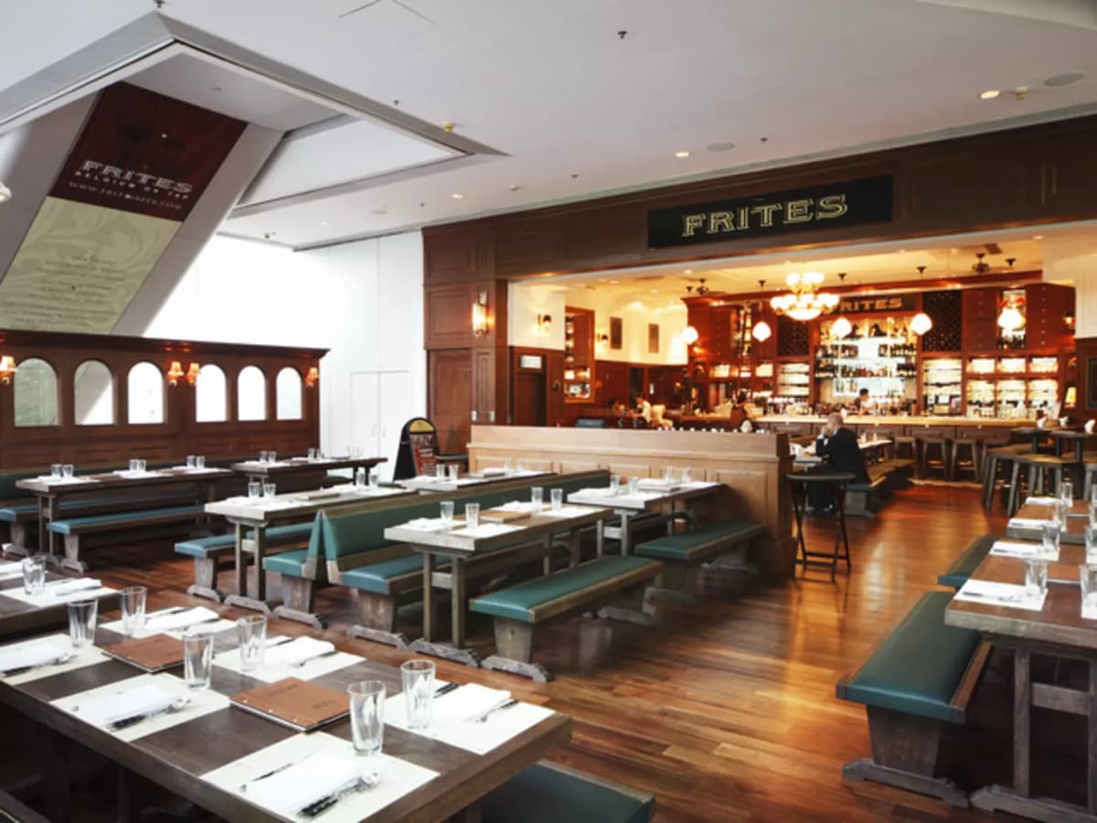 spacious main dining space with lot of tables and overlooked the bar area