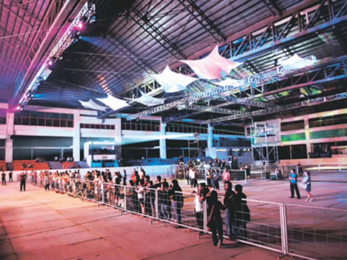 indoor exhibition event space with people's crowd