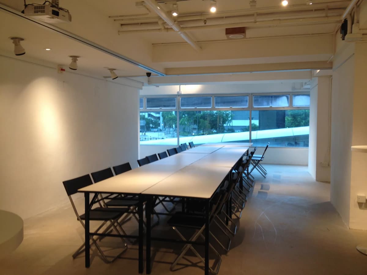 long meeting table in empty room