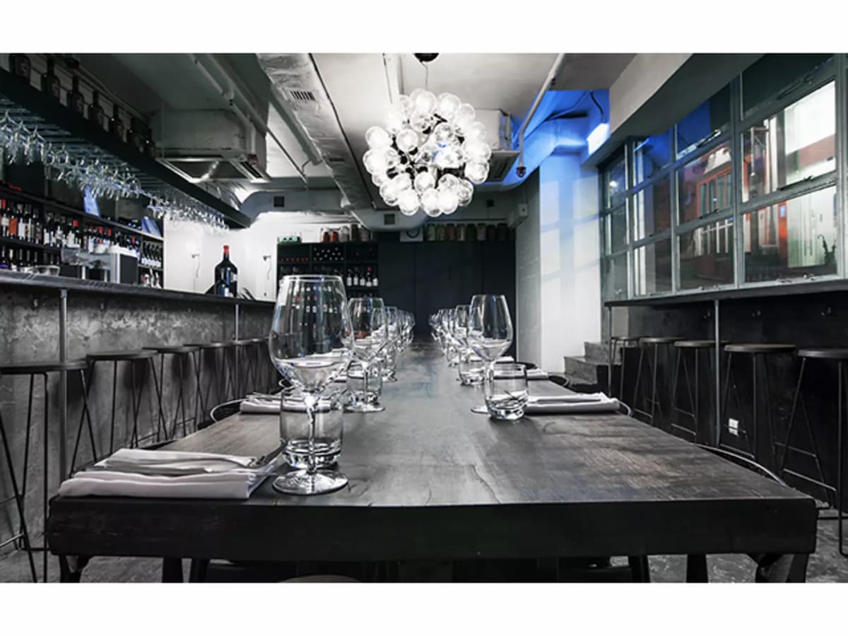 italian restaurant featuring selections of wines at the bar