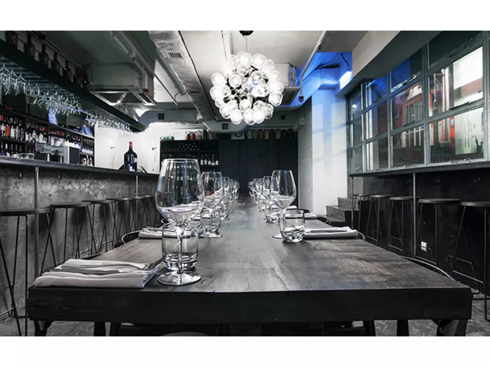 italian restaurant featuring selections of wines at the bar