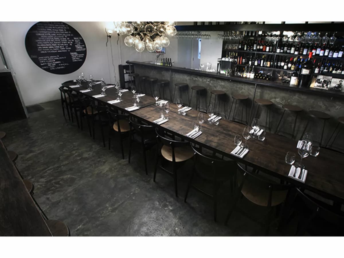 restaurant with plenty of polished concrete and black wood