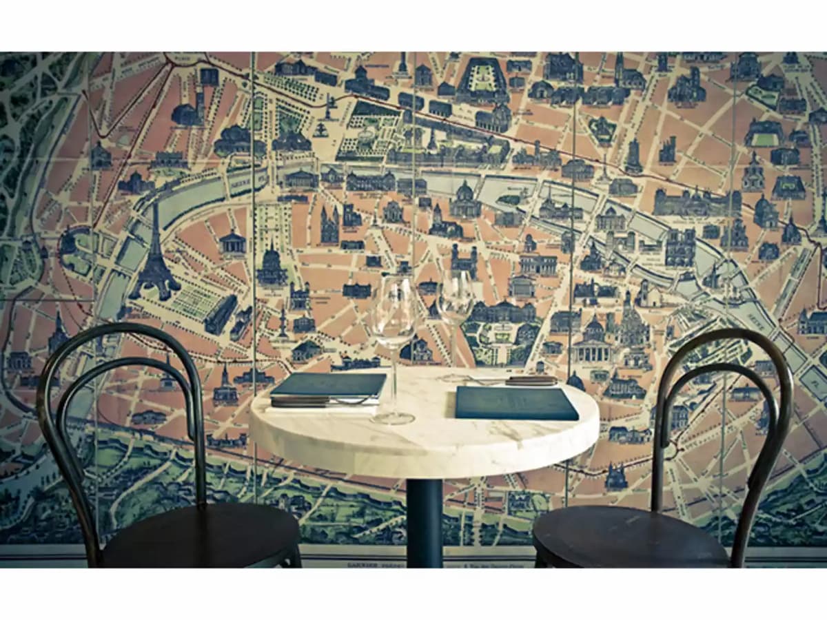 round table with bird-eye view of cityscape in background