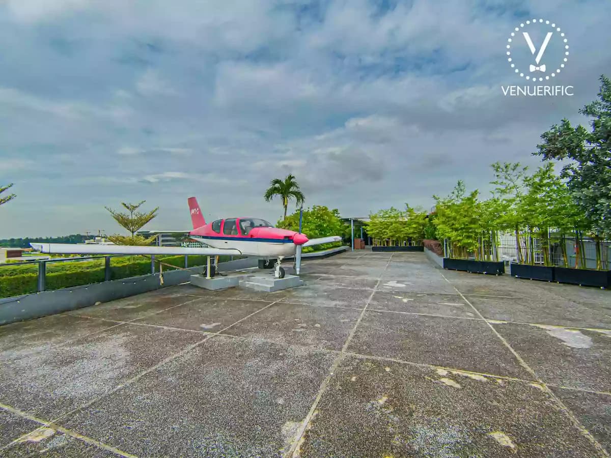 hangar area at the rooftop with a plane