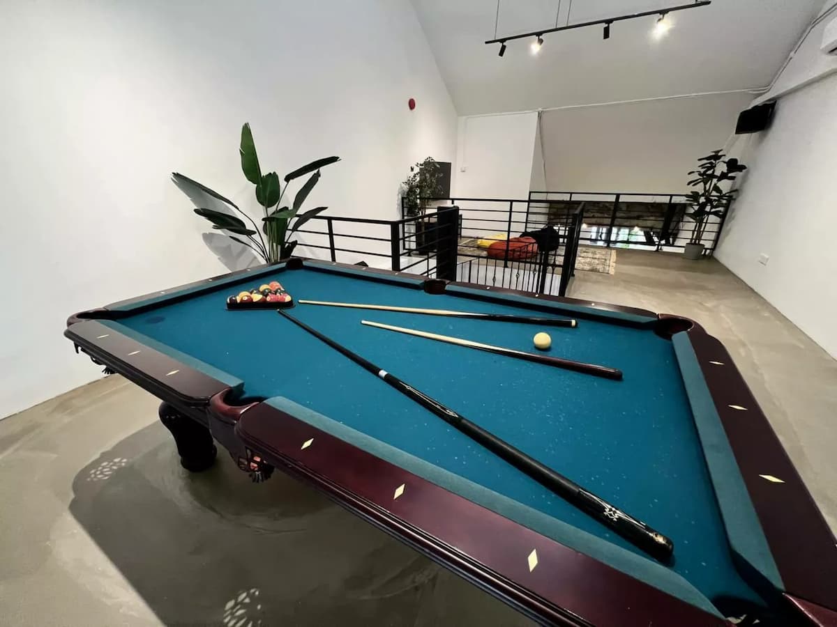 birthday party event venue in singapore with billiard table and bean bag chairs
