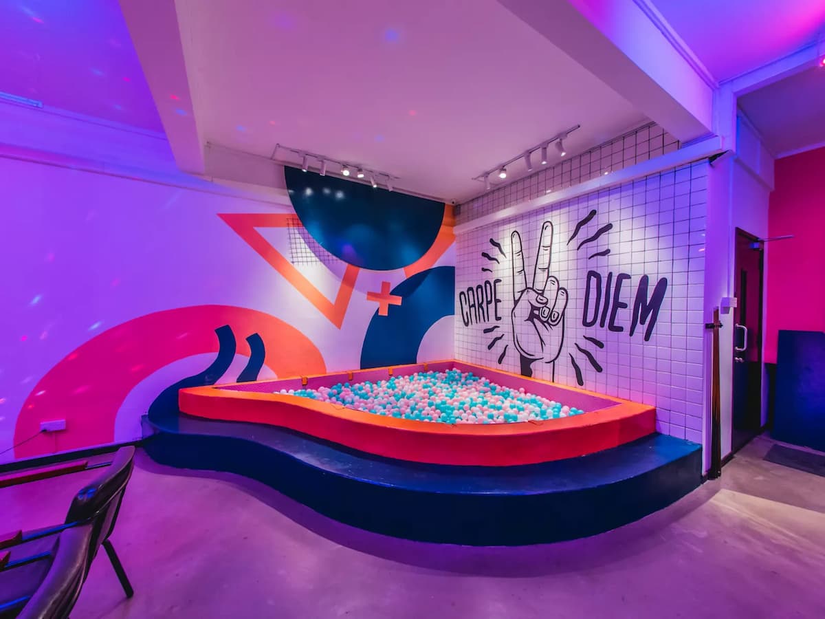 birthday party event venue for rent in singapore with fun neon lights and colourful ball pit