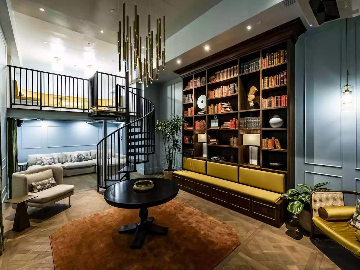 spiral staircase in a library event space with two floors