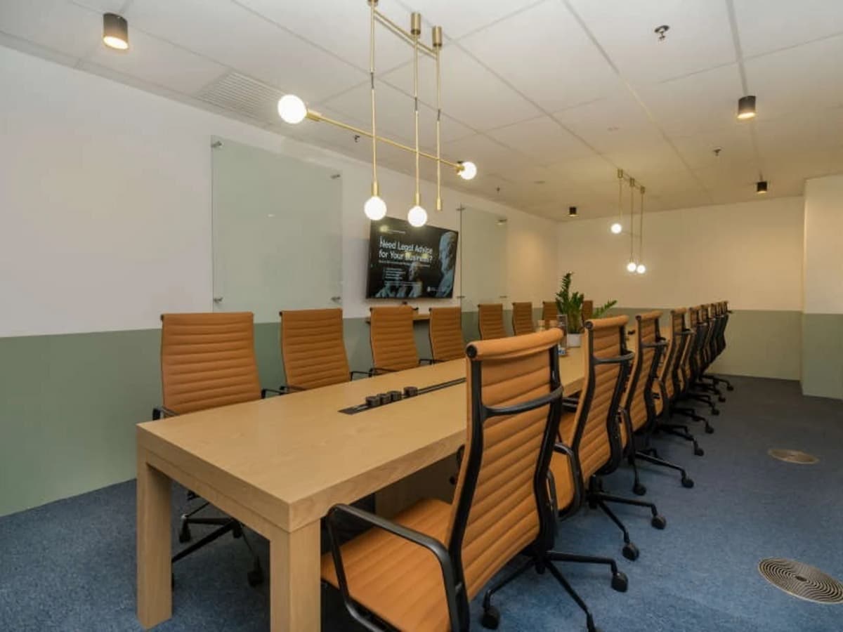 board room with long table and modern chairs