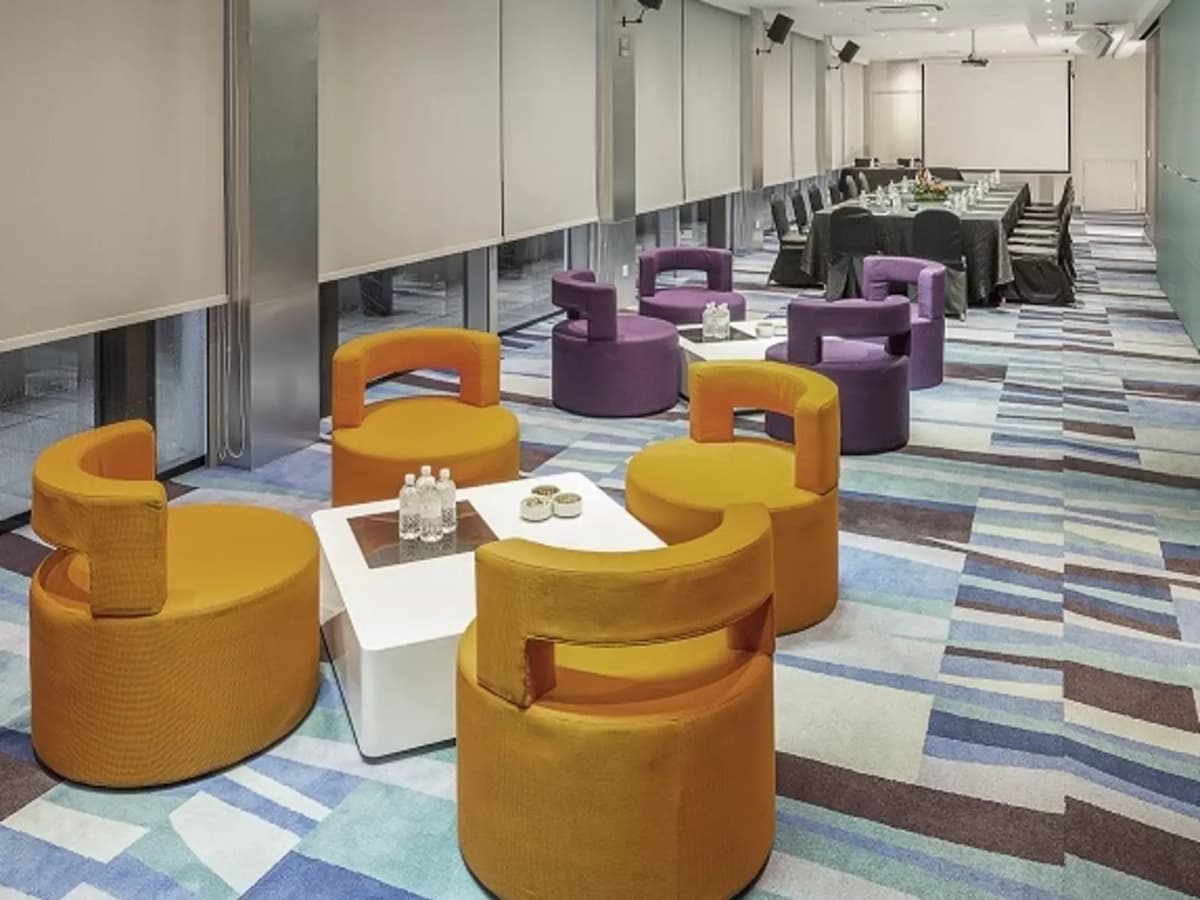 water bottles on tables in modern seminar room