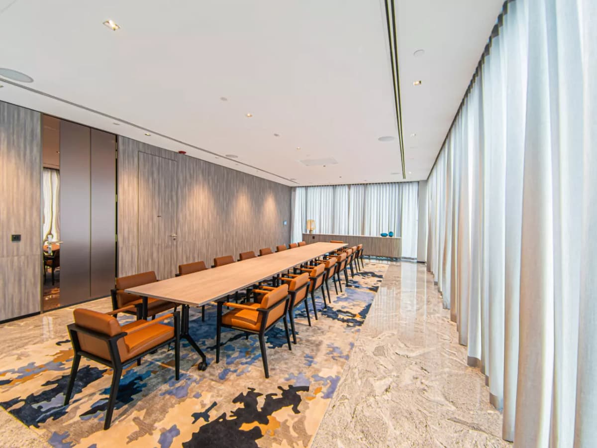 private dining room with long wooden table