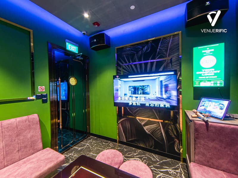 small karaoke room with walled flat tv screen