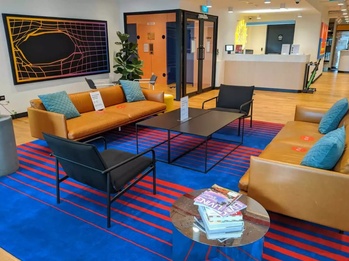 coworking sofa area with carpet, sofa area, grid painting