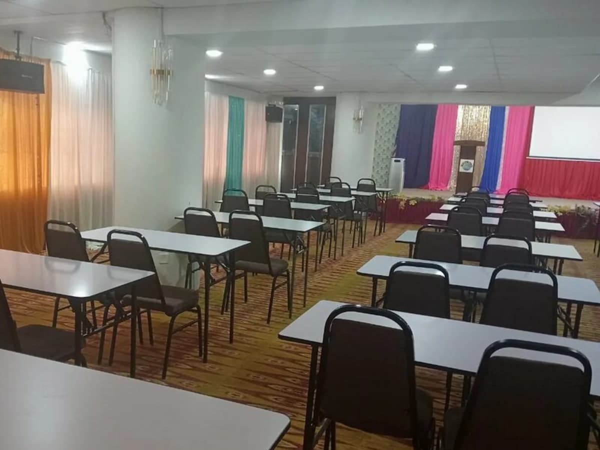 multifunctional event hall for rent with stage and projector screen
