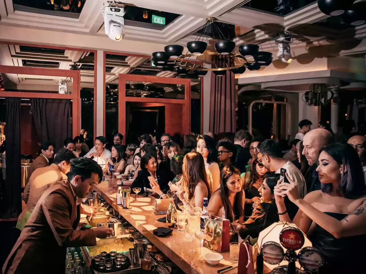 people gathering and socializing at the bar