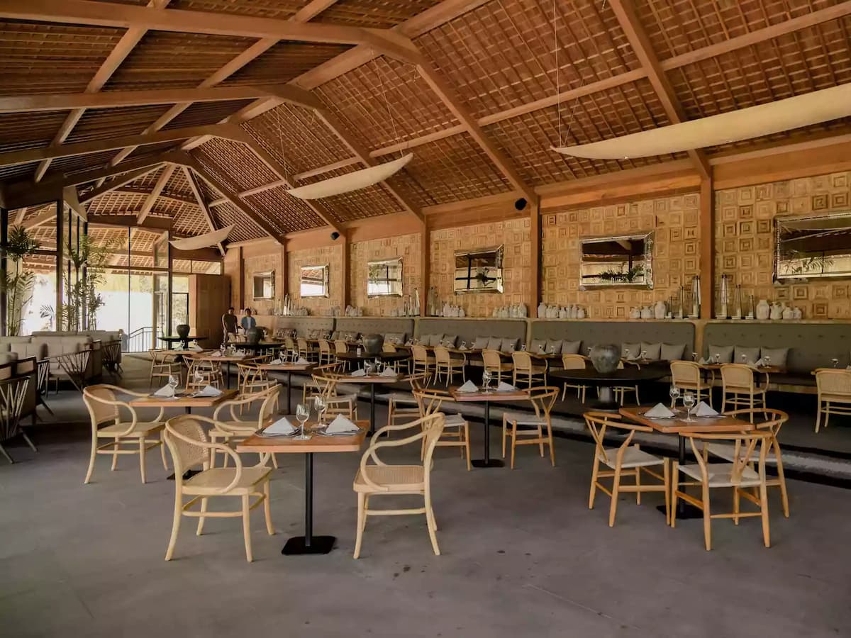 dining space with rattan and wooden interior
