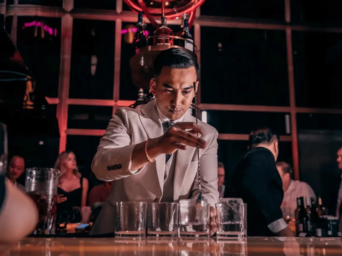 a bartender preparing cocktails