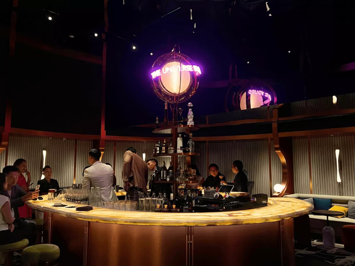people socializing at the bar