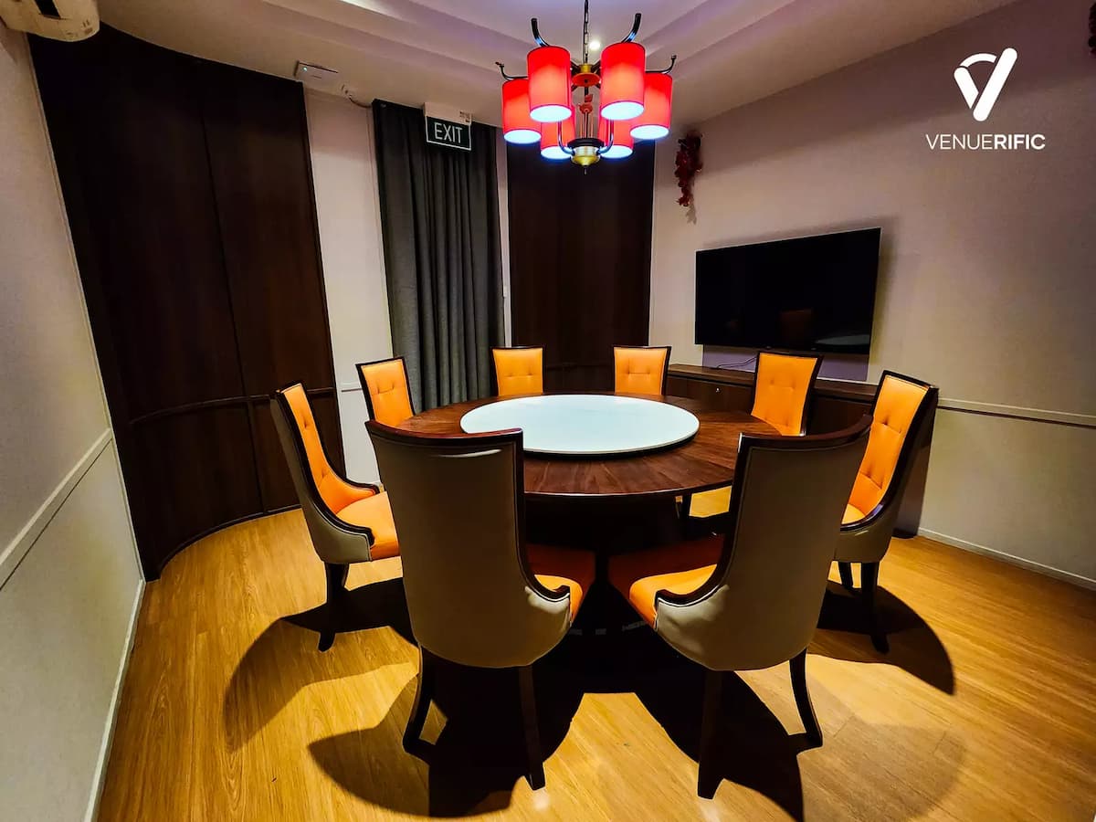 Private dining room with a round wooden table