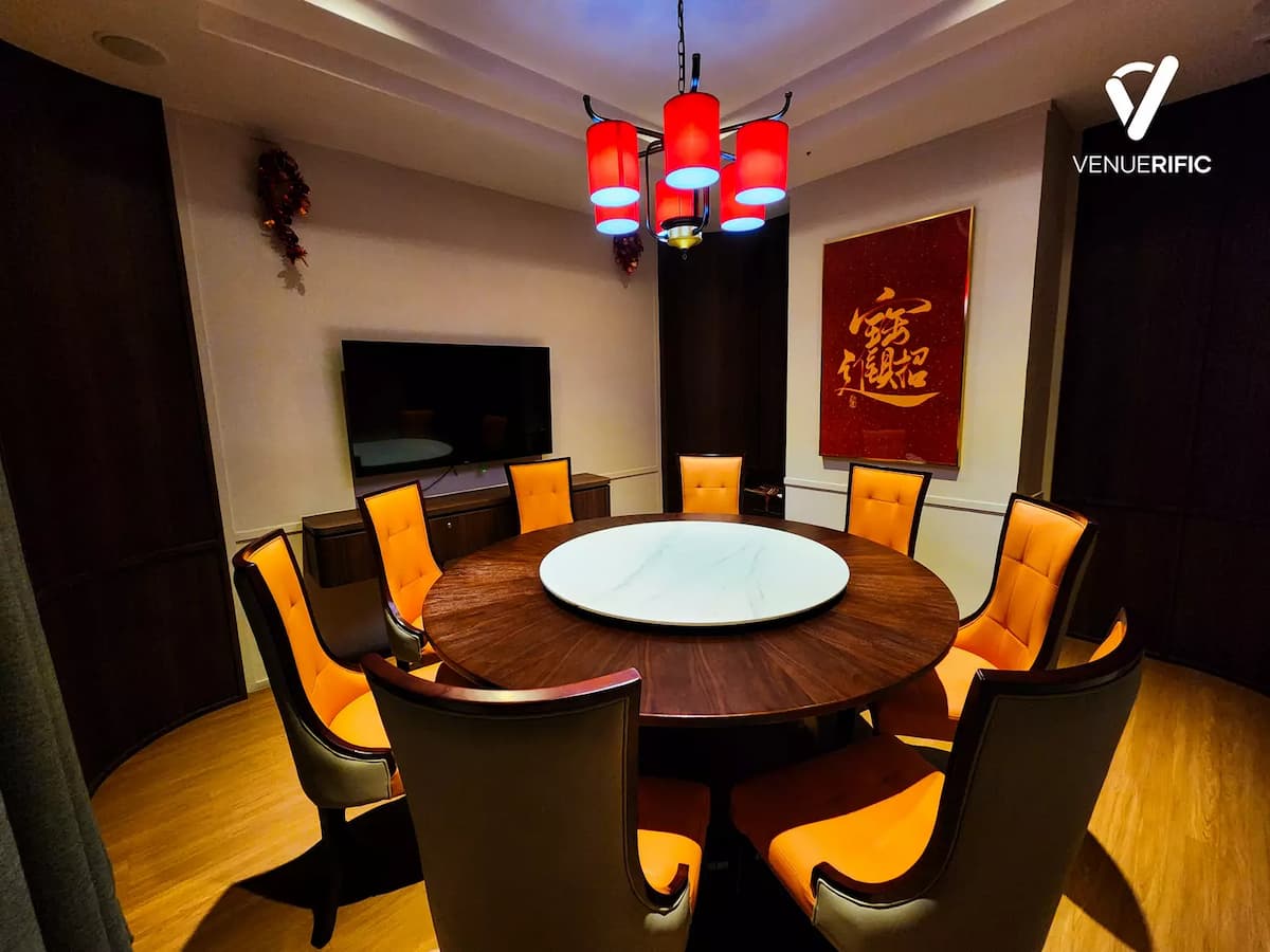 Private dining room with a round wooden table