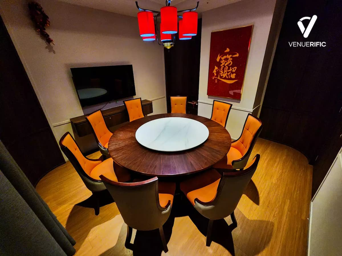 Private dining room with a round wooden table