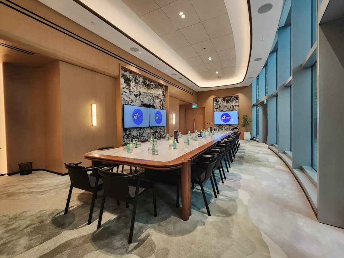 Elegant boardroom with long wooden table