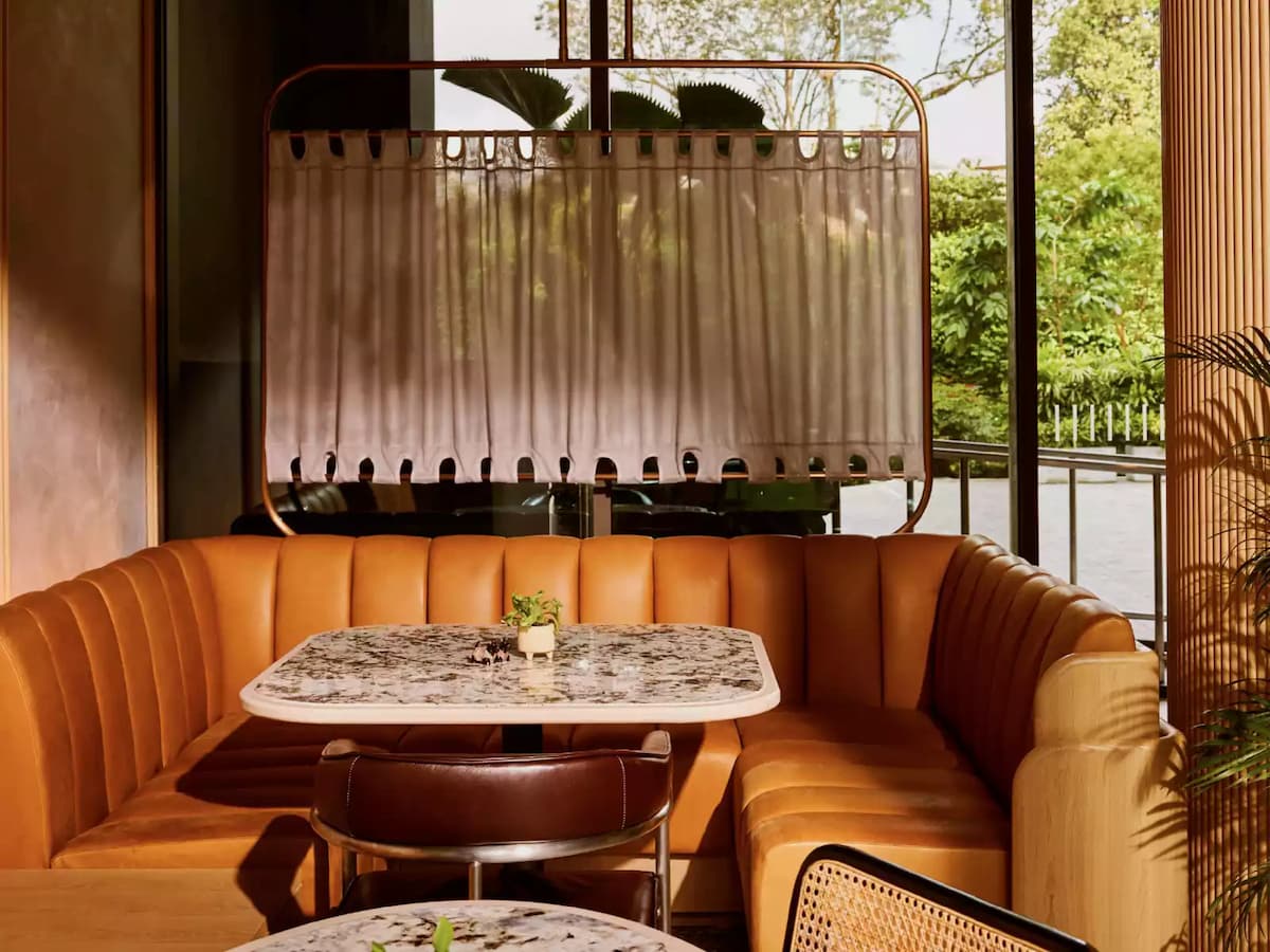 Private booth seating at The Standard Singapore event space