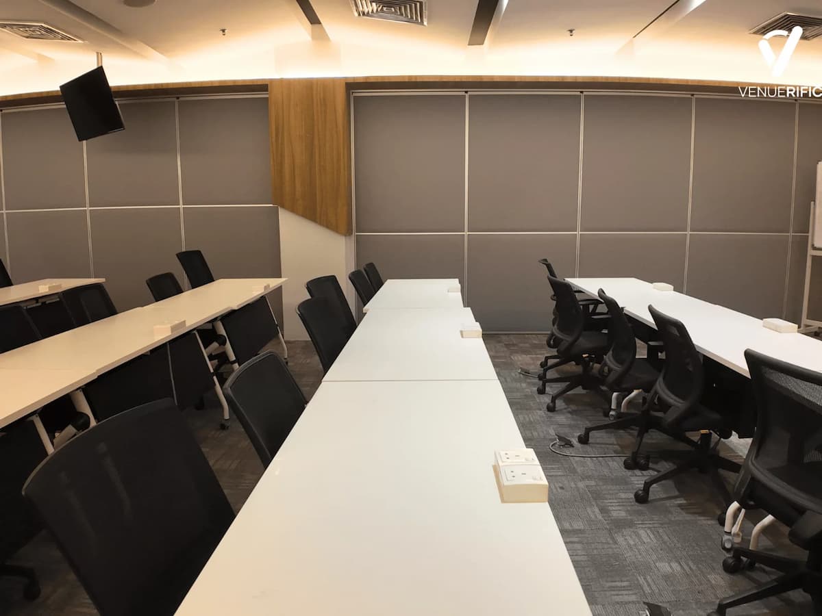 Mutiara Event Space with flexible classroom-style tables and ergonomic chairs, ideal for workshops or training sessions