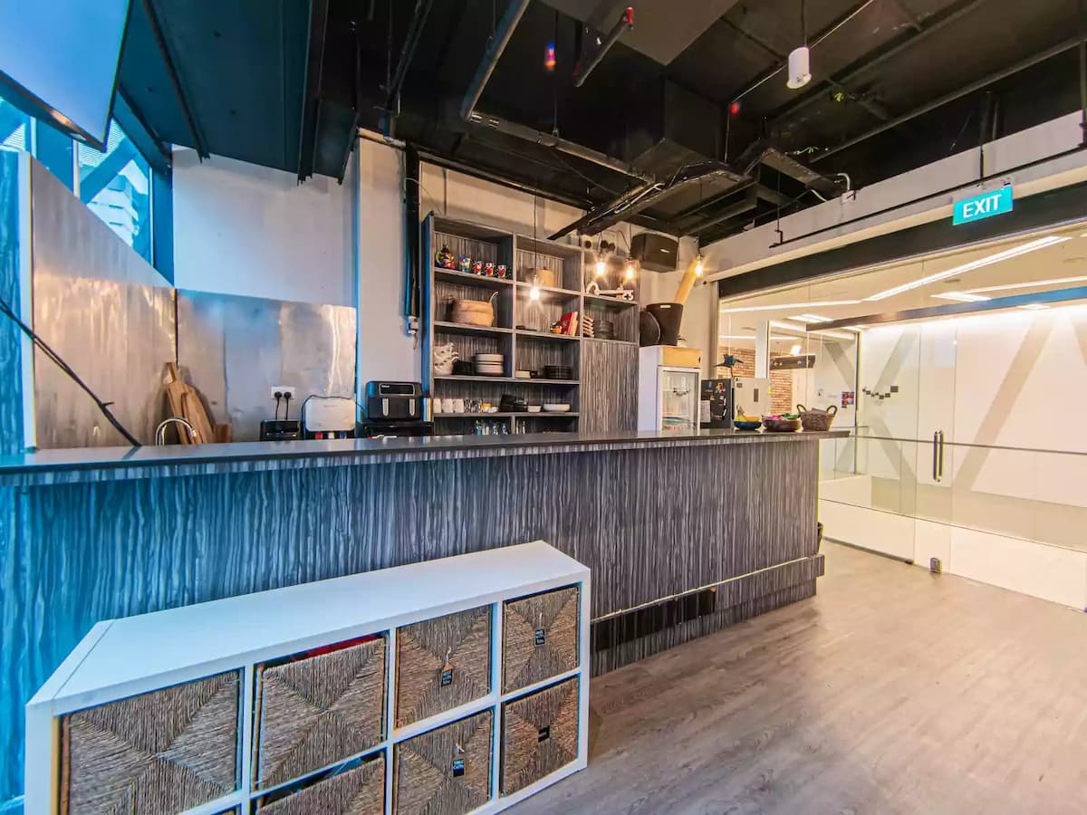 Modern pantry and reception area with a service counter and open shelving